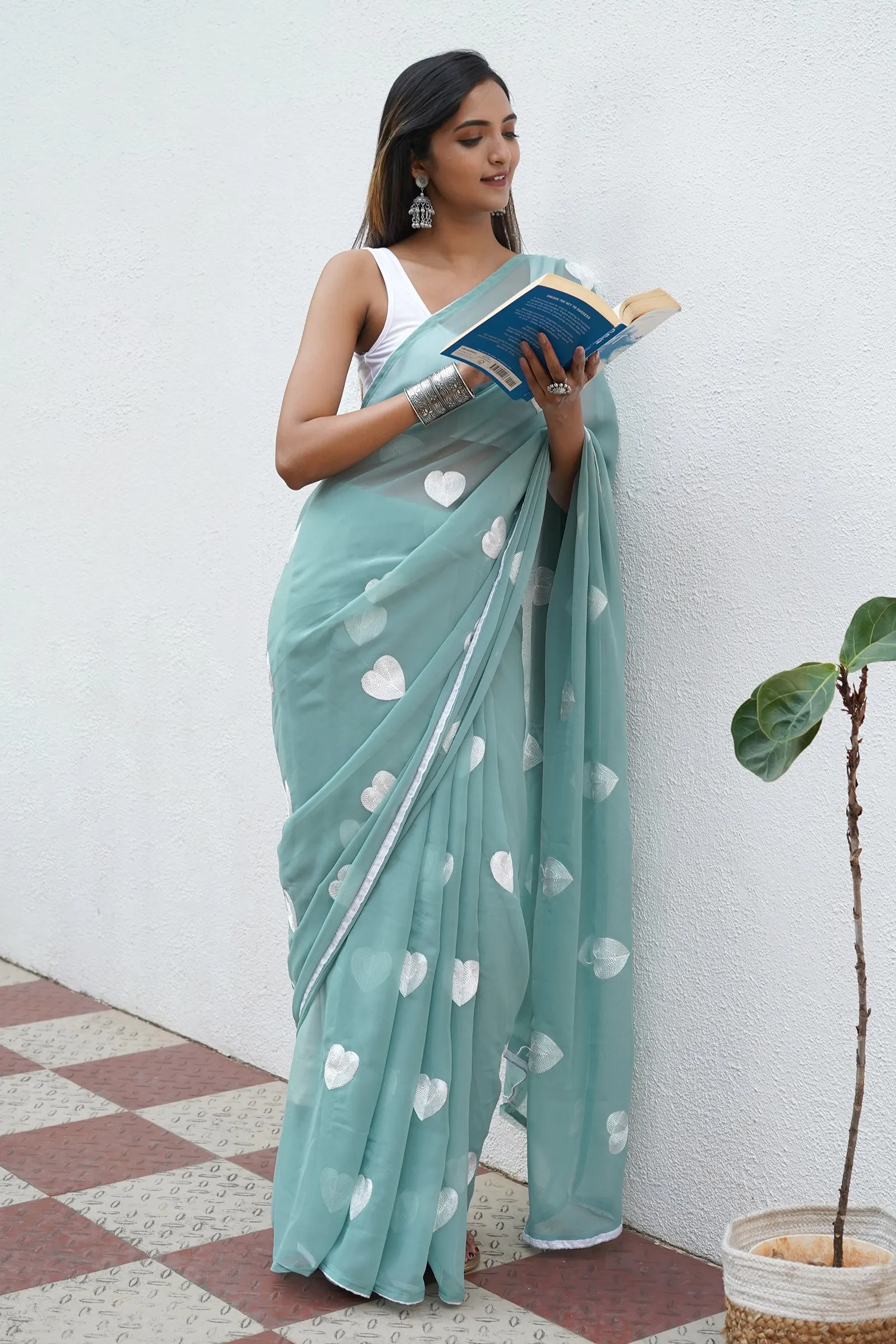 Teejh Heavenly Sea Green Georgette Saree